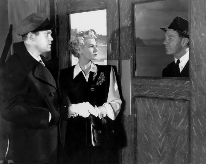 Framed Print : THE LADY FROM SHANGHAI, from left, Orson Welles, Rita Hayworth, Glenn Anders, 1947