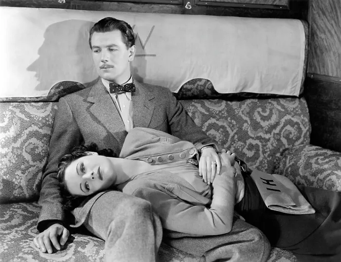 Framed Print : THE LADY VANISHES, Michael Redgrave, Margaret Lockwood (lying down), 1938 Framed Print : THE LADY VANISHES, Michael Redgrave, Margaret Lockwood (lying down), 1938