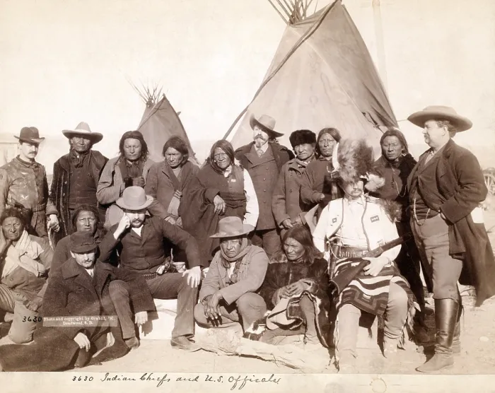 Framed Print : Lakota (Brul, Miniconjou, and Oglala) chiefs and U.S. officials in front of tipis at Pine Ridge Reservation. Pine Ridge, South Dakota. Photo by John C. Grabill. 1891