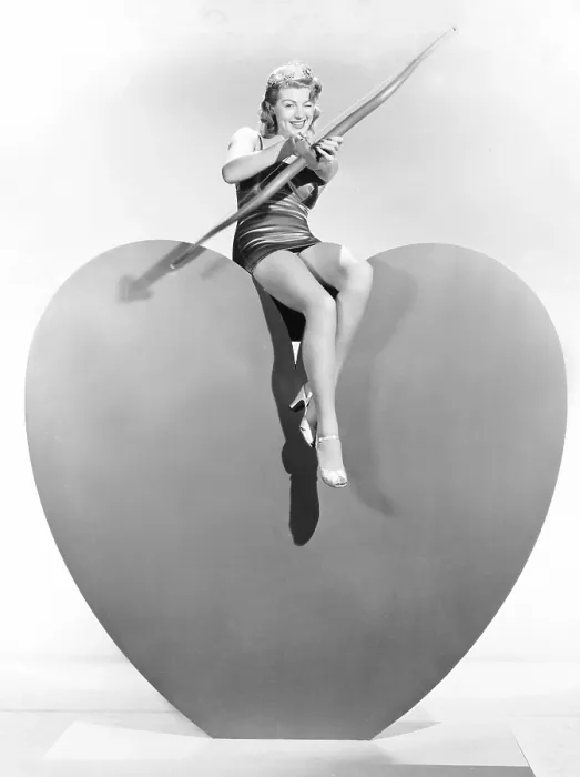Framed Print : Lana Turner aims Valentine greetings, ca. 1940 Framed Print : Lana Turner aims Valentine greetings, ca. 1940