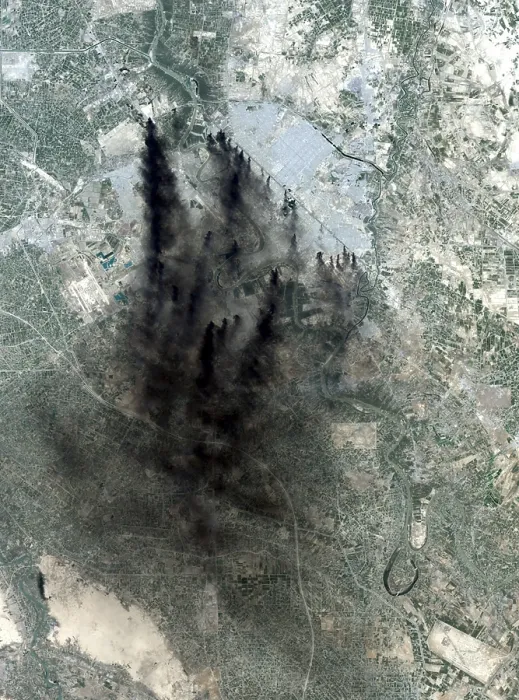 Framed Print : Landsat image of Baghdad showing dark smoke plumes from pits of burning oil around the city center a tactic used to stall and confuse invaders since medieval times