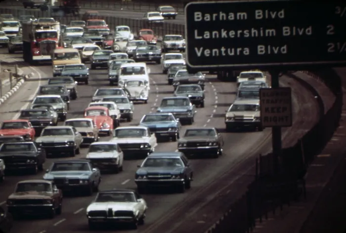 Framed Print : Four lanes of traffic on the Hollywood Freeway near Ventura beach in Los Angeles. Ca. 1973-75
