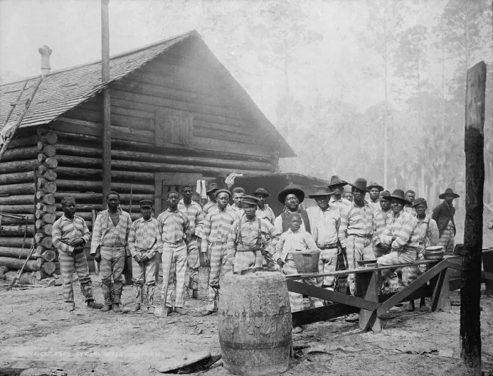 Framed Print : Large group of African American men includes a very young prisoner