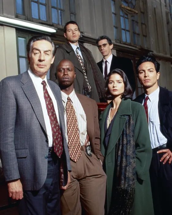 Framed Print : LAW & ORDER, HOMICIDE: LIFE ON THE STREET, front row, from left: Jerry Ohrbach, Andre Braugher, Jill Hennessy, Benjamin Bratt; back row, from left: Kyle Secor, Richard Belzer