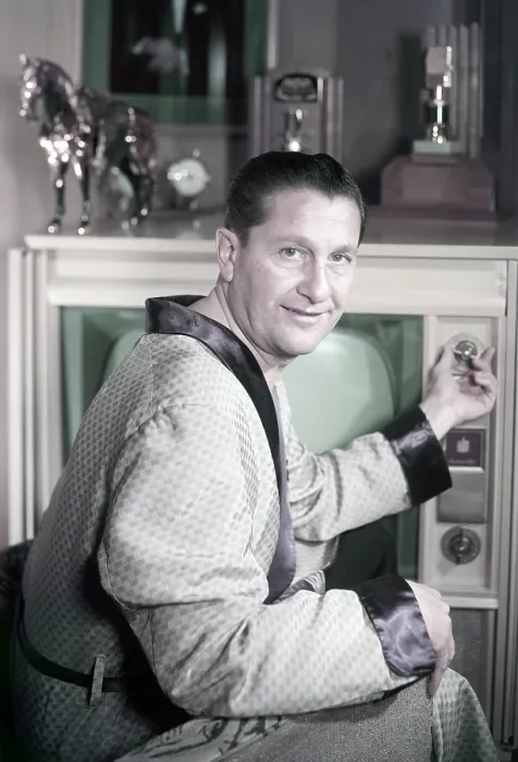 Framed Print : Lawrence Welk, at home, turning on television, ca. 1950s