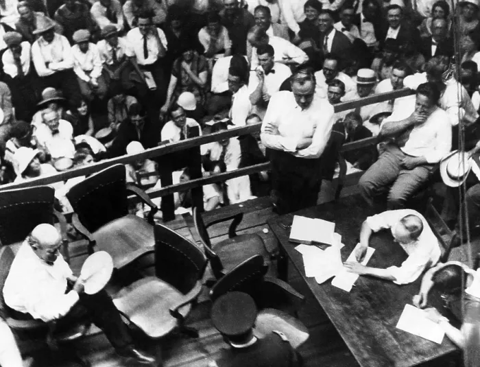 Framed Print : Lawyers William Jennings Bryan (left) and Clarence Darrow (arms folded) during the Scopes Trial. It was moved outdoors to escape the heat in the courtroom, 1925