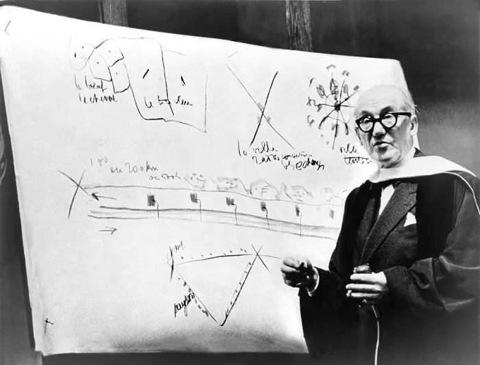 Framed Print : Le Corbusier (1887-1965), during a 1961 lecture, using design sketches. Le Corbusier was among the first generation architects who discarded the classical Greco-Roman vocabulary Framed Print : Le Corbusier (1887-1965), during a 1961 lecture, using design sketches. Le Corbusier was among the first generation architects who discarded the classical Greco-Roman vocabulary