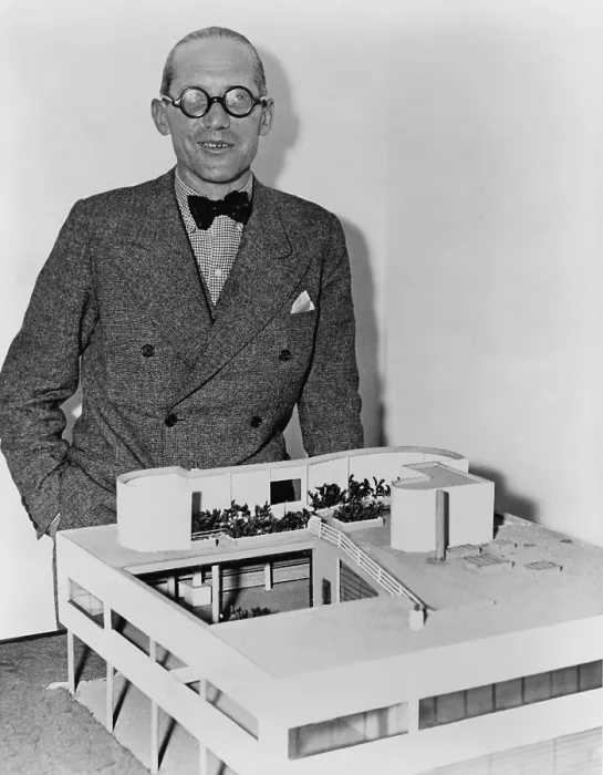 Framed Print : Le Corbusier (1887-1965), revolutionary French architect with a model of his ultra-modern residence, Villa Savoye. 1935 Framed Print : Le Corbusier (1887-1965), revolutionary French architect with a model of his ultra-modern residence, Villa Savoye. 1935