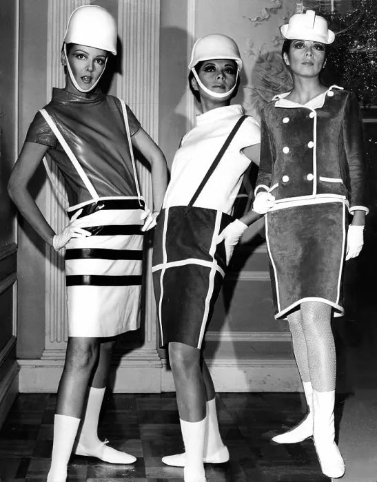 Framed Print : Leather barrel-shaped skirts with suspenders and cowl necked blouses designed by Andre Courreges, 1965. Photo: CSU / Everett Collection Framed Print : Leather barrel-shaped skirts with suspenders and cowl necked blouses designed by Andre Courreges, 1965. Photo: CSU / Everett Collection