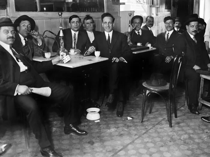 Framed Print : Lebanese-Syrian immigrant men in suits smoking hookahs in a restaurant in the New York City neighborhood, possibly Bay Ridge, Brooklyn
