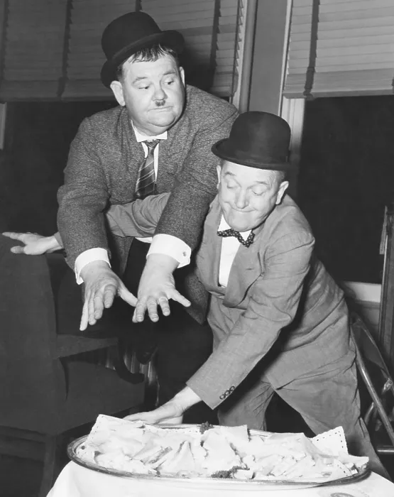 Framed Print : From left: Oliver Hardy, Stan Laurel, backstage at the Earle Theatre where they are appearing, Philadelphia, PA, December 3, 1940