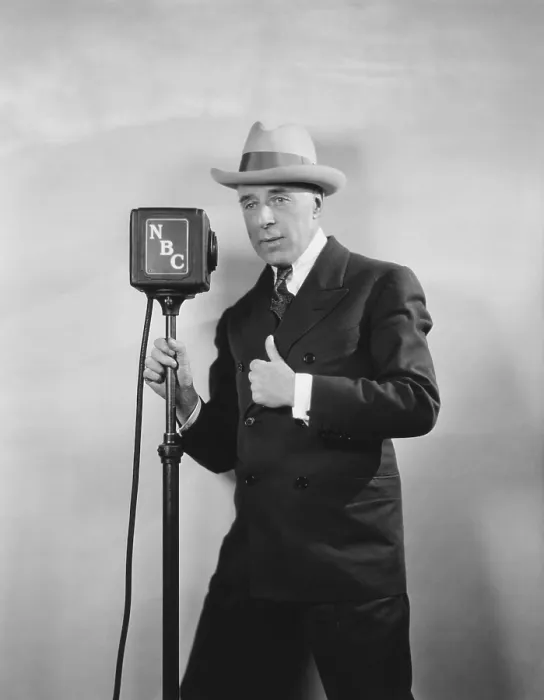 Framed Print : Legendary movie director D. W. Griffith broadcasting, D. W. Griffith's Hollywood. Ca. 1930. The NBC radio program was a review of his life and history of Hollywood