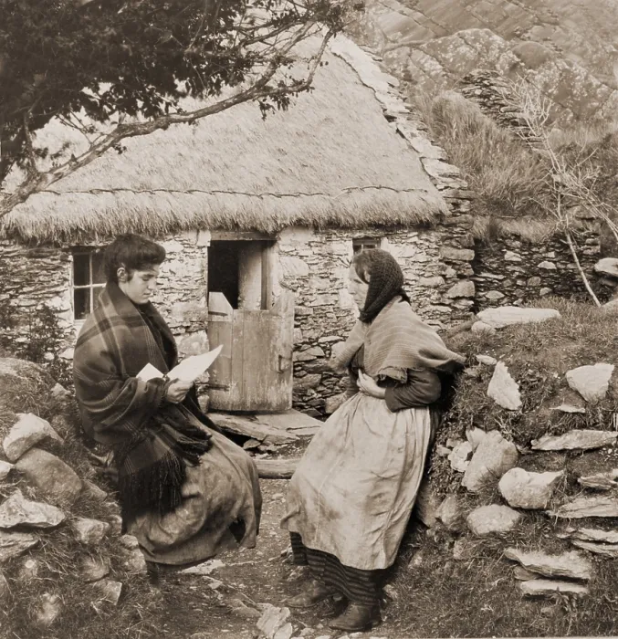 Framed Print : A LETTER FROM PAT IN AMERICA. Young Irish woman reading a letter from a relative in America to an older woman outside of a thatch-roofed stone cottage Framed Print : A LETTER FROM PAT IN AMERICA. Young Irish woman reading a letter from a relative in America to an older woman outside of a thatch-roofed stone cottage