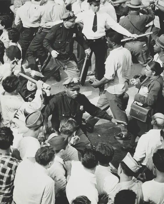 Framed Print : Two lines of police hold back rioters, allowing attendees of the Paul Robeson concert to leave. Peekskill, N.Y. Sept. 4, 1949. The riot attracted national attention Framed Print : Two lines of police hold back rioters, allowing attendees of the Paul Robeson concert to leave. Peekskill, N.Y. Sept. 4, 1949. The riot attracted national attention
