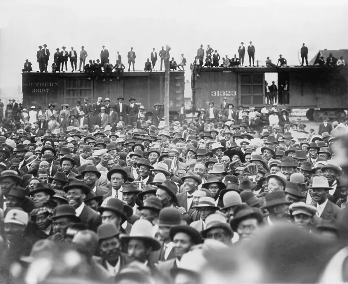 Framed Print : Listening to Booker T. Washington. An African American audience, some standing on railroad box cars, in New Orleans, Louisiana. 1912 Framed Print : Listening to Booker T. Washington. An African American audience, some standing on railroad box cars, in New Orleans, Louisiana. 1912