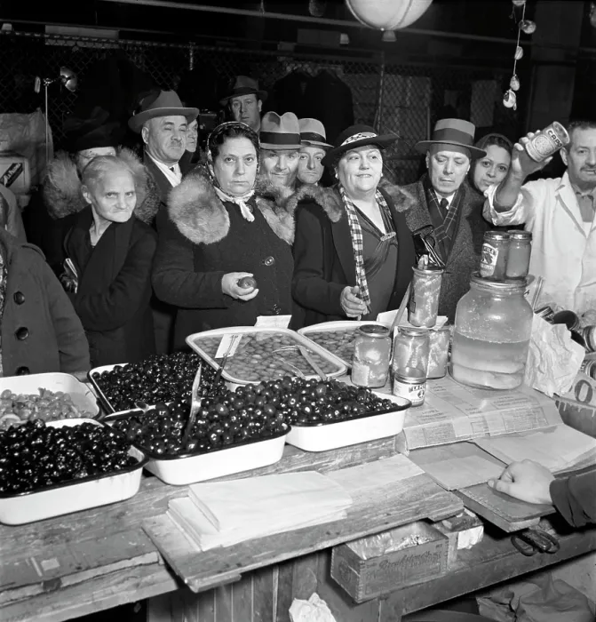 Framed Print : Little Italy - vendor with wares displayed during a festival, New York, ca. 1930s