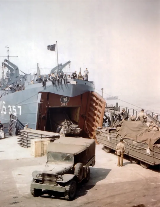 Framed Print : Loading a Landing Ship in Portland, England, before the D-Day invasion. Vehicles include a Dodge WC 51 and GMC DUKW 353 to be delivered to Omaha Beach. June 1944, World War 2