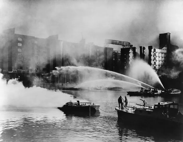 Framed Print : London Firemen direct water from their fireboats onto blazing warehouse. The Germans bombed the port facilities on the London waterfront Framed Print : London Firemen direct water from their fireboats onto blazing warehouse. The Germans bombed the port facilities on the London waterfront
