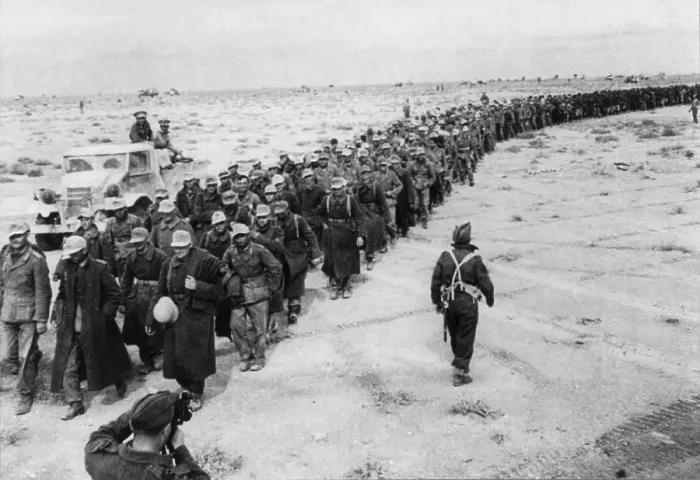 Framed Print : Long line of German prisoners captured during the Battle of Libya. They are marching from the battle front to a prisoners-of-war camp near Tobruk. Ca. 1942 during World War 2