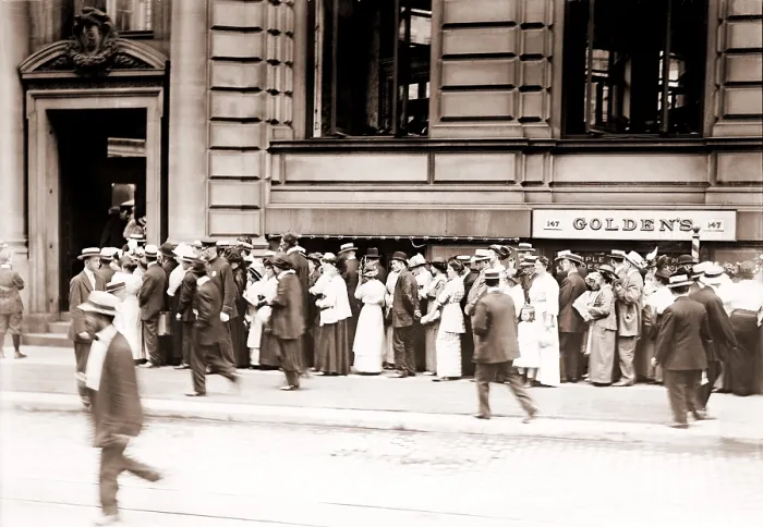 Framed Print : A long line of men and women line up in a run on the German American Bank of New York City. Ca. 1905-1915