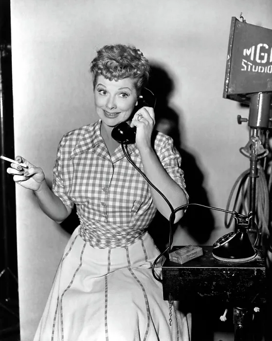 Framed Print : THE LONG, LONG TRAILER, Lucille Ball on the phone on set, 1954