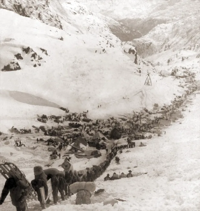 Framed Print : Long ribbon of miners bound for the Klondike gold fields climbing over the Chilcoot Pass, in 1898