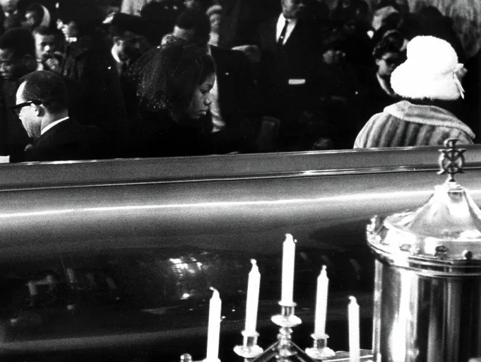 Framed Print : A Last Look: Mrs. Betty Little Shabazz, widow of Malcolm X, walks away from coffin after viewing the body of her husband during funeral services February 27th, 1965