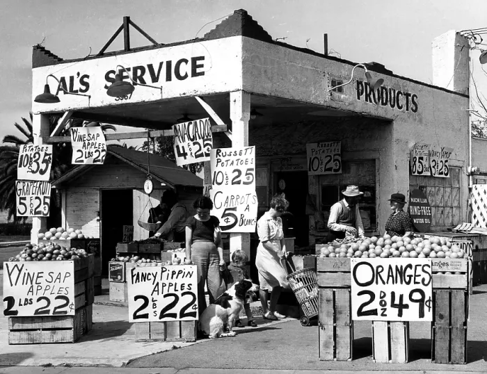 Framed Print : A Los Angeles gasoline station selling fruit and vegatables during a fuel shortage. Los Angeles, California, March, 1944. Courtesy: CSU Archives / Everett Collection