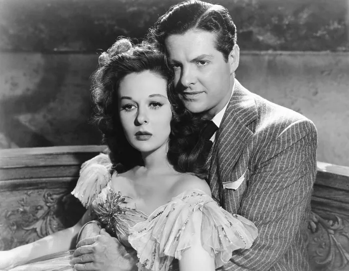 Framed Print : THE LOST MOMENT, from left: Susan Hayward, Robert Cummings, 1947