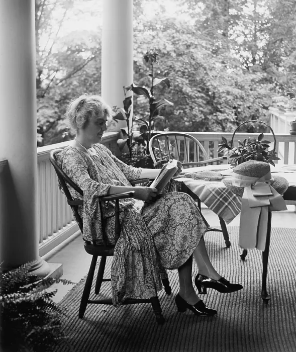 Framed Print : Lou Henry Hoover, future First Lady, reading on her porch in 1926. She was highly educated and a skilled linguist. (BSLOC_2015_16_57)