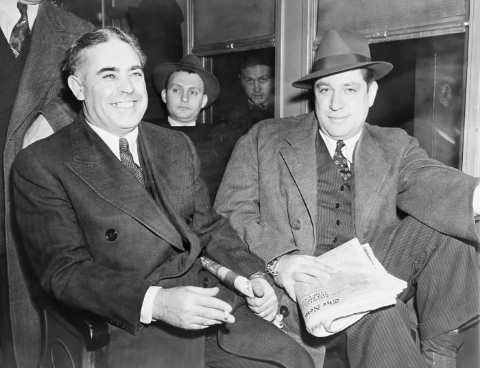 Framed Print : Louis Capone (1896-1944) and Emanuel Mendy Weiss (1906-1944)(right), ride the New York Central railroad up the river to the Sing Sing Prison on December 3, 1941