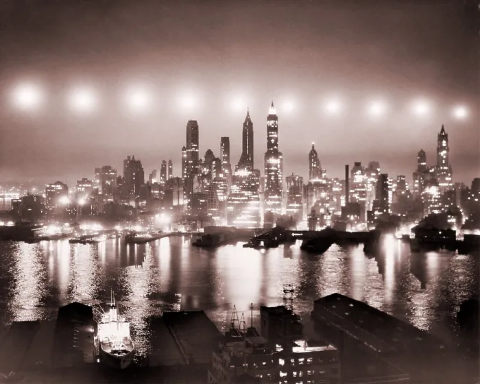 Framed Print : Lower Manhattan illuminated by ten photoflash cartridges of 50, 000, 000 candlepower each, dropped from a B-17 in June 1949 during a U.S.A.F. test of new photographic equipment