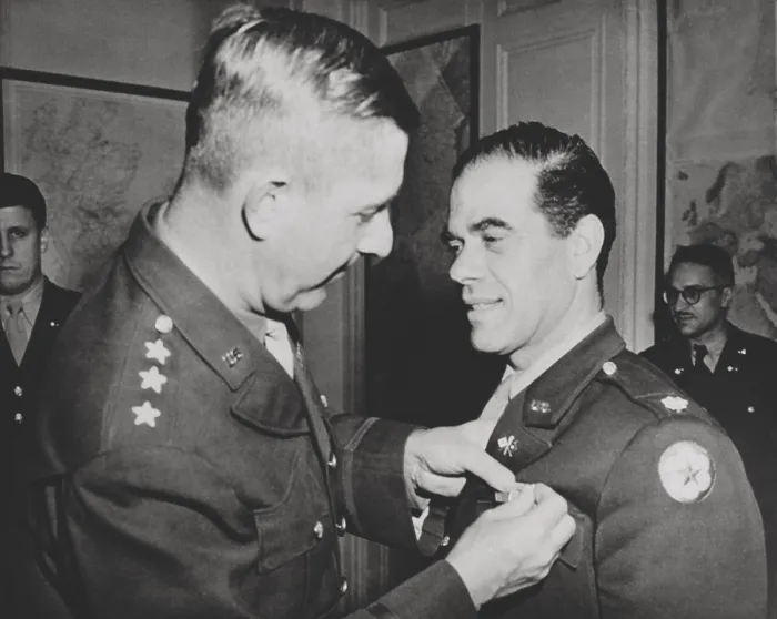 Framed Print : Lt. Col. Frank Capra, receives the Legion of Merit. The Hollywood movie director was chief of the U.S. Army Signal Corps motion picture production unit