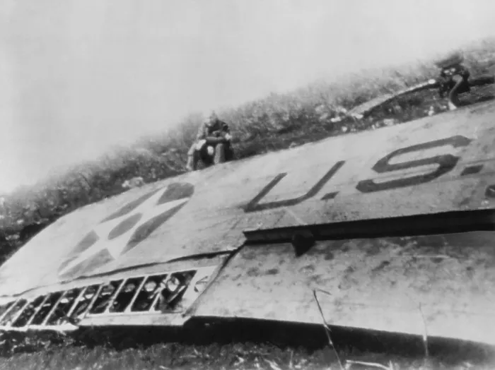 Framed Print : Lt. Col. Jimmy Doolittle sits by a wing of his crash-landed plane somewhere in China Framed Print : Lt. Col. Jimmy Doolittle sits by a wing of his crash-landed plane somewhere in China
