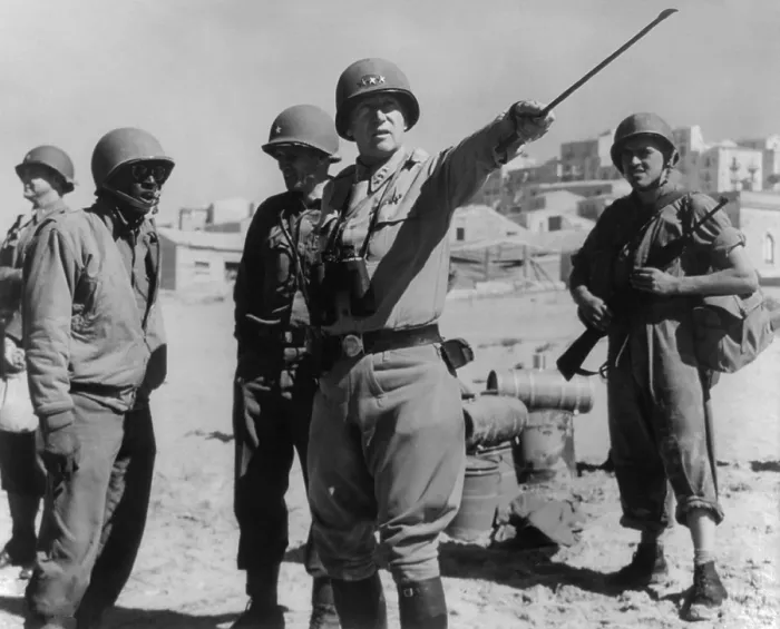 Framed Print : Lt. General George Patton leading invasion troops in Sicily. July 11, 1943 during World War 2. (BSLOC_2014_8_127)