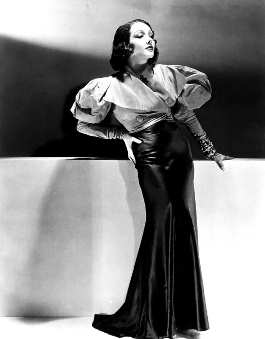 Framed Print : Lupe Velez wearing blue satin skirt with red taffeta jacket, 1933 Framed Print : Lupe Velez wearing blue satin skirt with red taffeta jacket, 1933