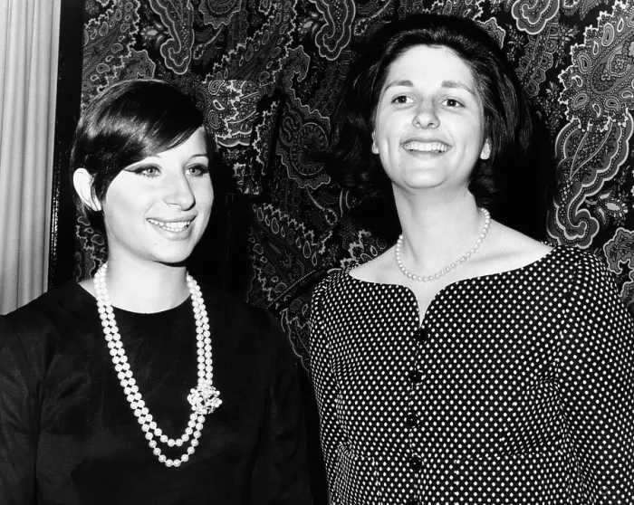 Framed Print : Lynda Bird Johnson (right) is greeted backstage by Barbra Streisand