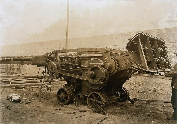 Framed Print : Machine used in a mine that digs the coal and loads it on the car, with it 3 men can do the work of 50 in the old way, yet they use boys to drive and trap, Gary, West Virginia