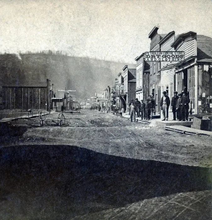 Framed Print : Main Street of the oil town, Petroleum Centre, Pennsylvania. The town was quickly built during the oil boom, and resembles a Western town with rough streets and only basic stores Framed Print : Main Street of the oil town, Petroleum Centre, Pennsylvania. The town was quickly built during the oil boom, and resembles a Western town with rough streets and only basic stores