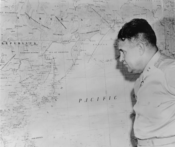 Framed Print : Major General Leslie Richard Groves, viewing a wall map of coastal East Asia and Japan, after the first use of the Atomic bomb against civilian targets in Hiroshima and Nagasaki