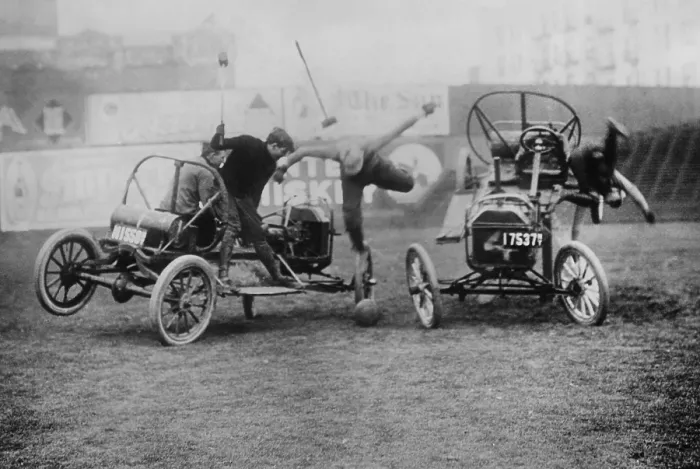 Framed Print : Mallet men are thrown from the cars in an auto polo match in the 1910s Framed Print : Mallet men are thrown from the cars in an auto polo match in the 1910s