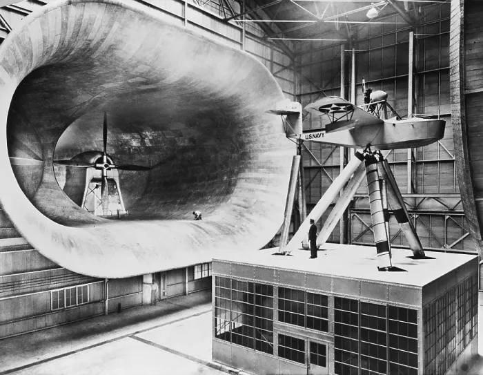 Framed Print : Mammoth seven story high wind tunnel, used in testing airplane design. 1932