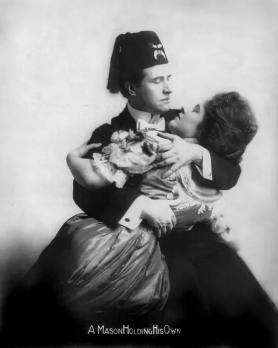 Framed Print : Man with a fez embracing a woman, original title: A Mason Holding his own, May 18, 1908