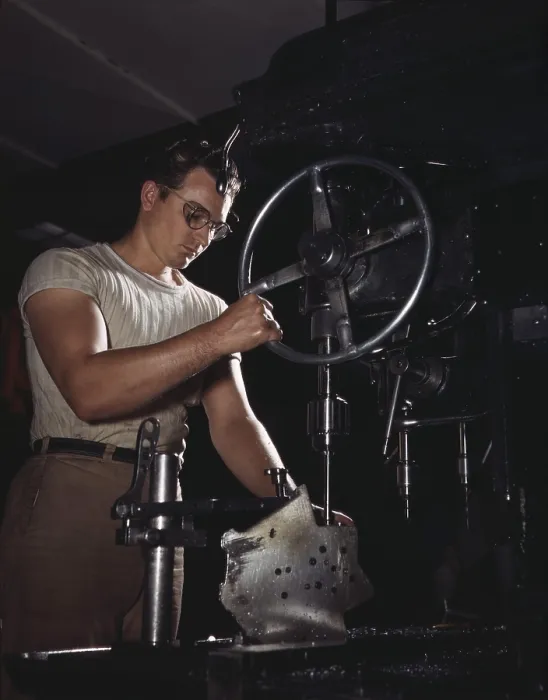 Framed Print : Man operates a drill-press in the North American Aviation's Inglewood, California plant, which built B-25 bombers and Mustang fighters. October 1942