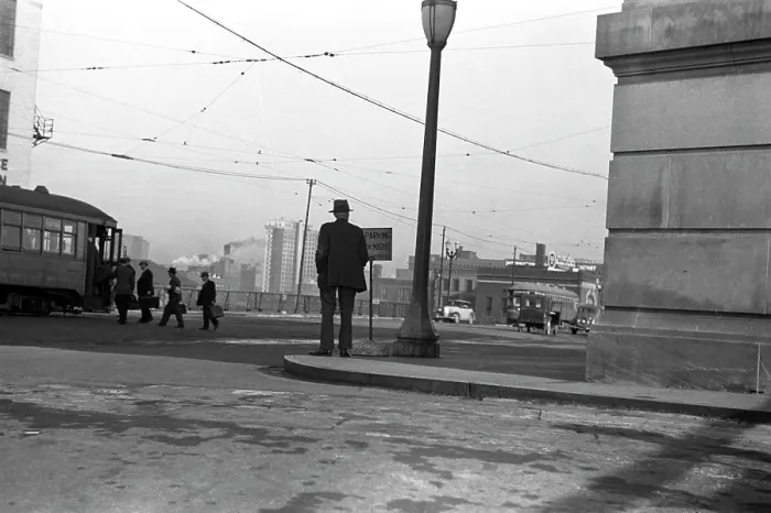 Framed Print : Man standing on corner, 6:30 a.m. in front of Union Station, Omaha, Nebraska, photograph by John Vachon, October, 1938 Framed Print : Man standing on corner, 6:30 a.m. in front of Union Station, Omaha, Nebraska, photograph by John Vachon, October, 1938