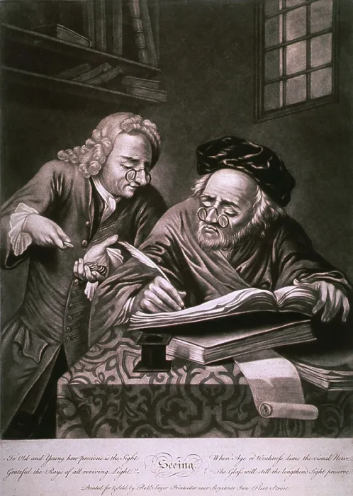 Framed Print : Man wearing spectacles tallies an account book while another man counts coins. Print entitled, SEEING, illustrates the use of glasses to assist the old and weak sighted Framed Print : Man wearing spectacles tallies an account book while another man counts coins. Print entitled, SEEING, illustrates the use of glasses to assist the old and weak sighted
