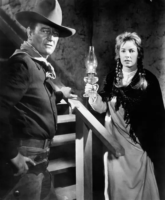 Framed Print : THE MAN WHO SHOT LIBERTY VALANCE, John Wayne, Vera Miles, 1962
