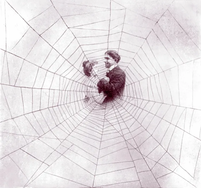 Framed Print : Man and woman in middle of spider web to illustrate the song, The Spider and the Fly, lantern slide print, circa 1901