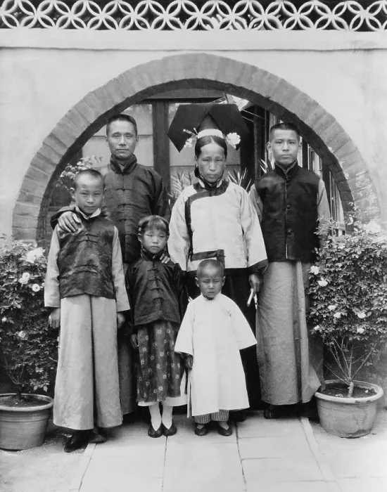 Framed Print : A Manchu family dressed in traditional Manchurian clothing. The daughter has natural feet since the Manchu women did not bind their feet