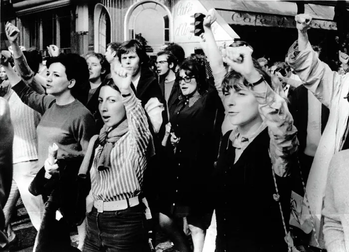 Framed Print : MARCHES-Men & women throw their arms in the air during a march through the streets of downtown Paris for popular government in France. 5 / 29 / 68
